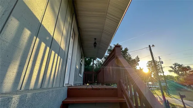 a view of a backyard with a tub