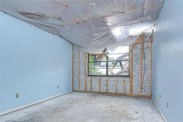 a bathroom with a toilet a sink a mirror and vanity