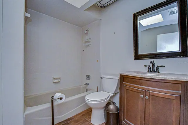 a utility room with closet dryer and washer