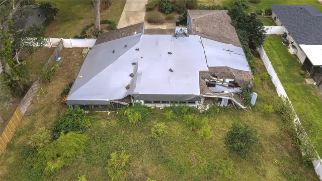a view of a sign of golf club on a tree
