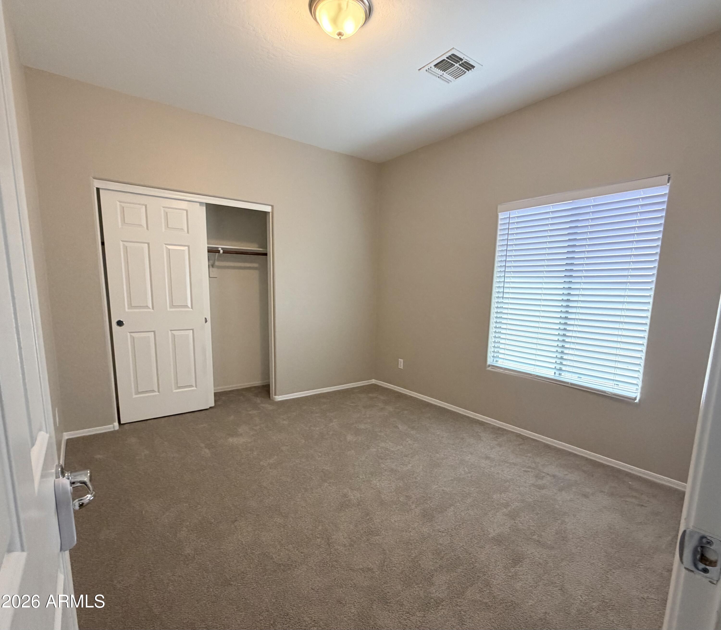 191 West Rio Drive Casa Grande, AZ 85122 - Photo 26 of 34 a view of an empty room with a window