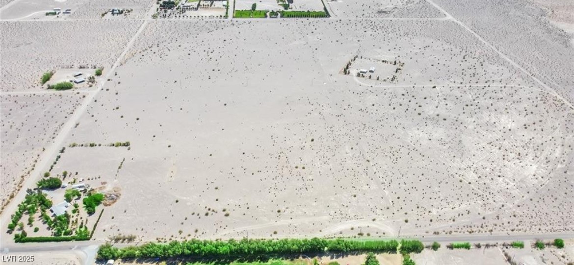 3699 South Miner Road Amargosa Valley, NV 89020 - Photo 5 of 7 Birds eye view of property with view of desert