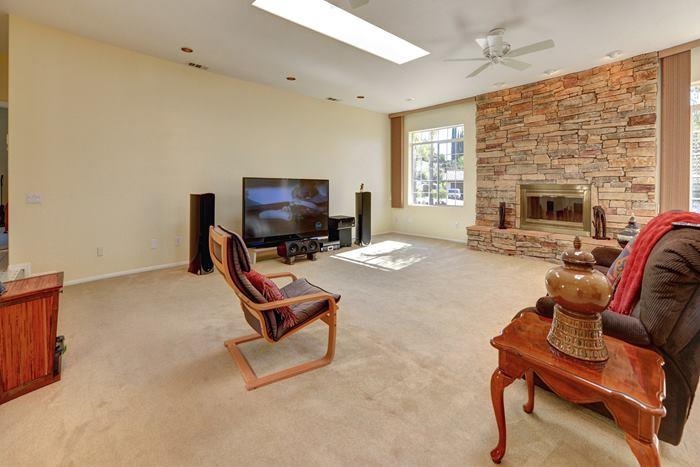 1740 Penasco Road El Cajon, CA 92019 - Photo 2 of 15 Spacious Living room with custom stone work on fireplace.