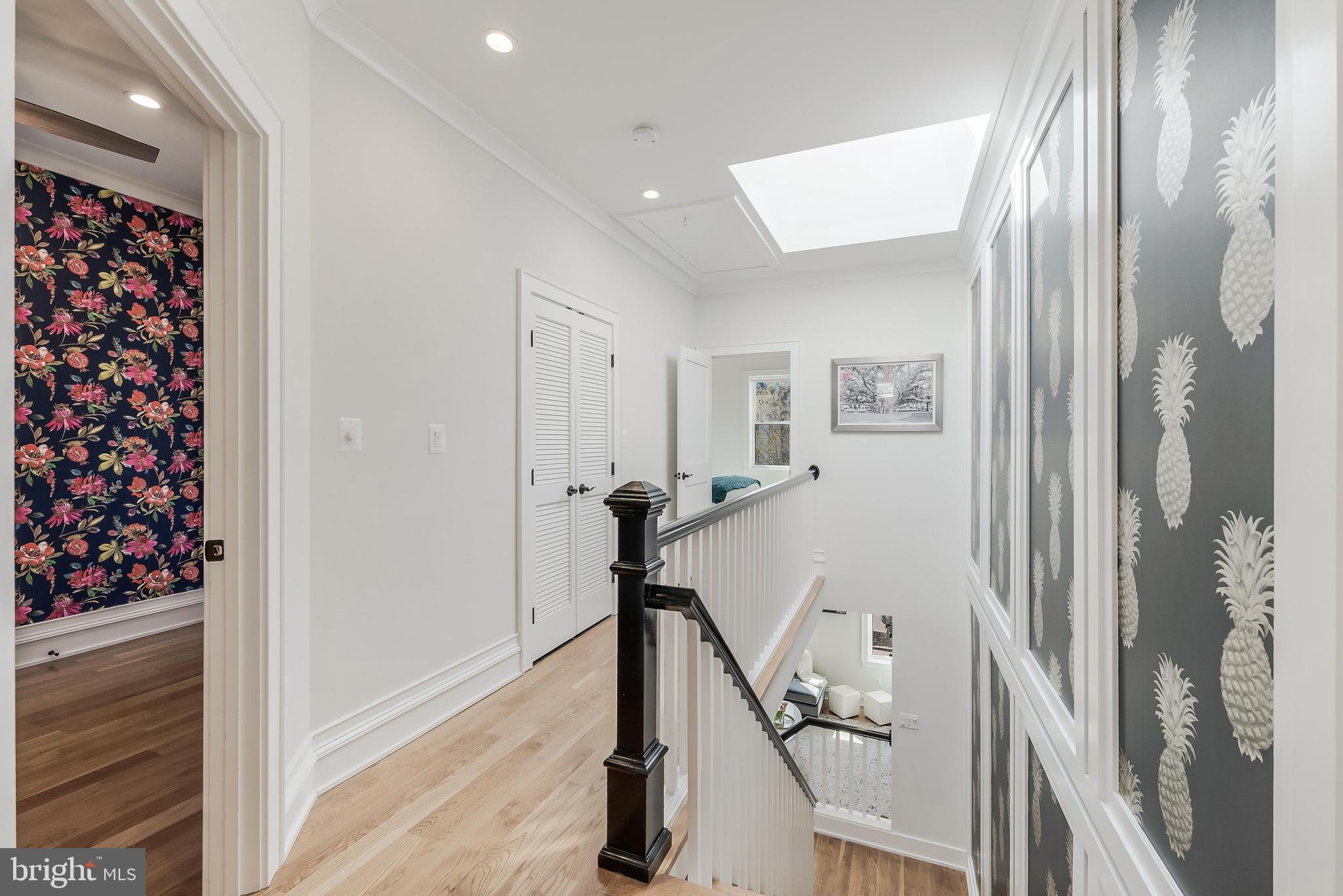 648 F Street Northeast Washington, DC 20002 - Photo 16 of 45 a view of a hallway with workspace