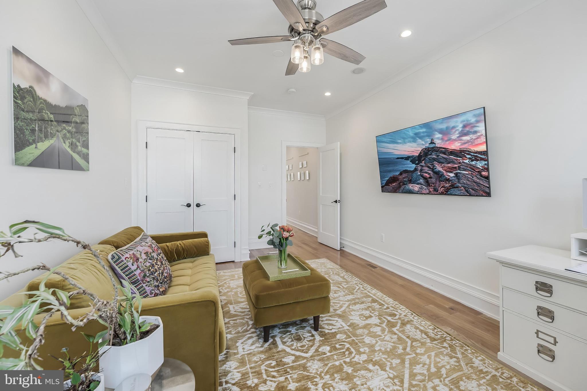648 F Street Northeast Washington, DC 20002 - Photo 22 of 45 a living room with furniture and a rug