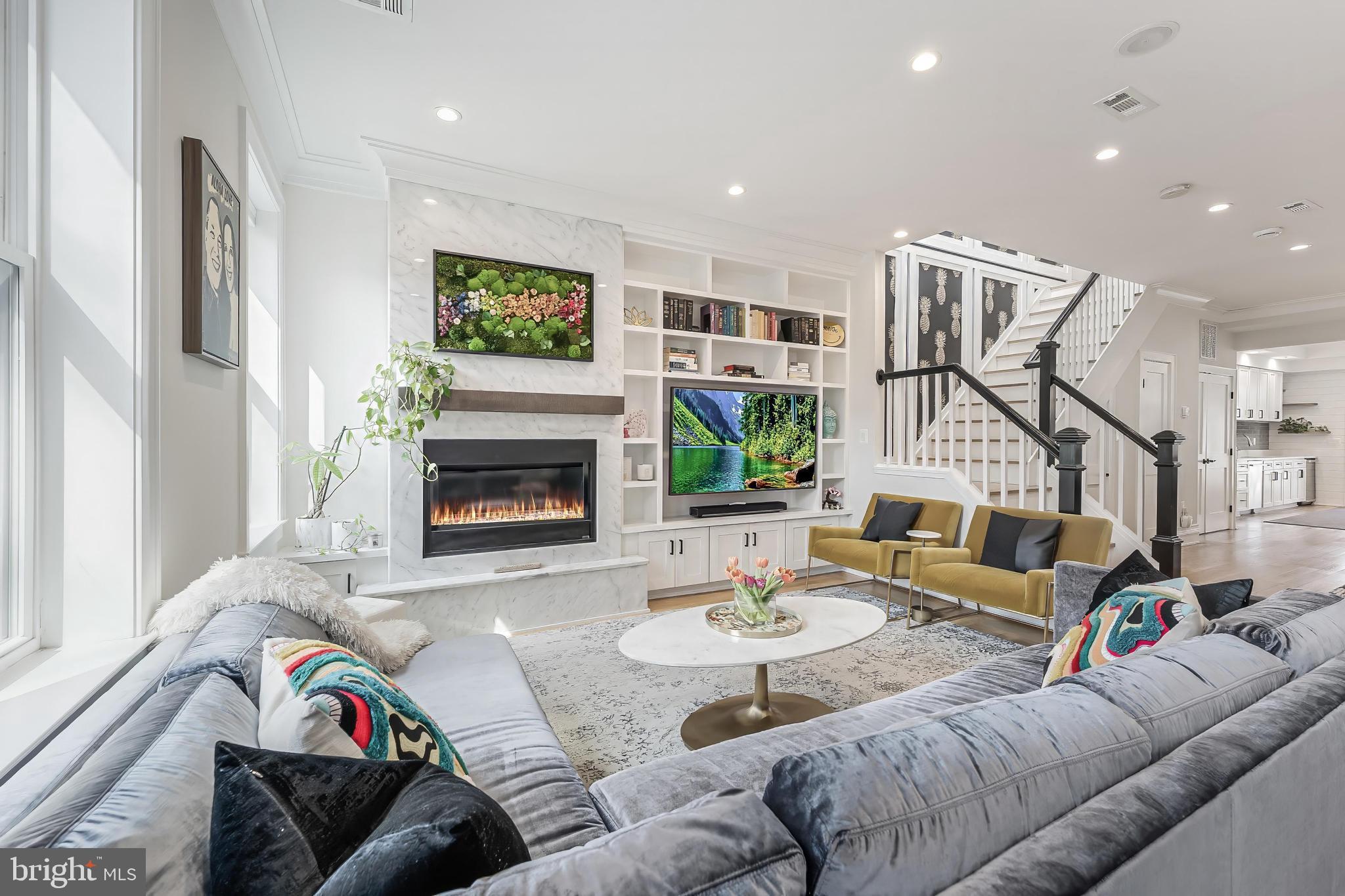 648 F Street Northeast Washington, DC 20002 - Photo 3 of 45 a living room with furniture and a fireplace