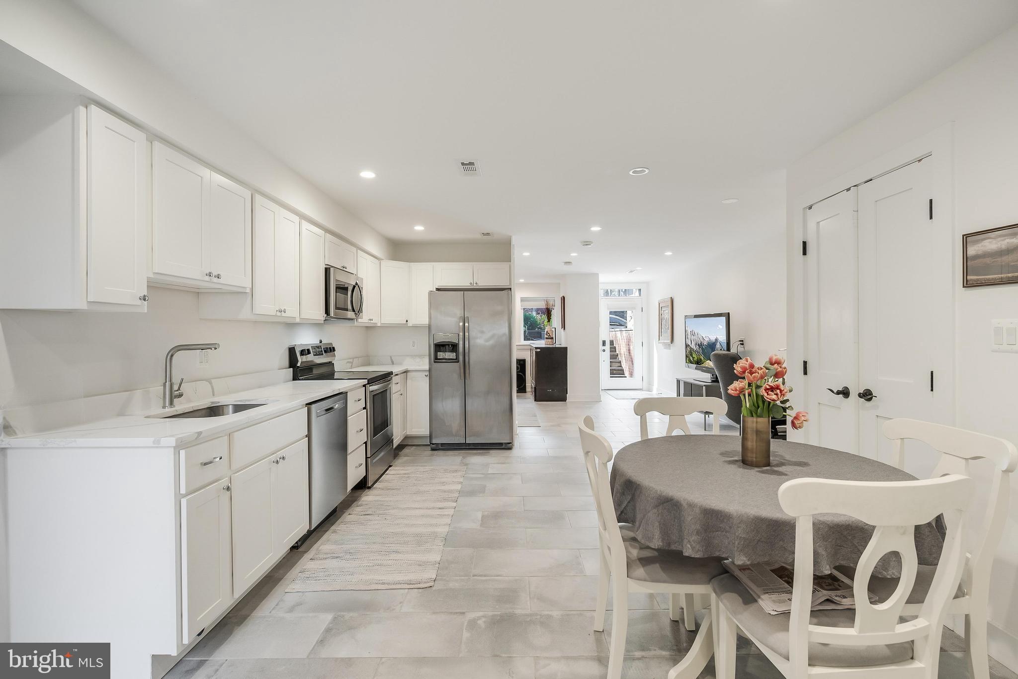 648 F Street Northeast Washington, DC 20002 - Photo 30 of 45 LOWER LEVEL KITCHEN WITH TABLE SPACE