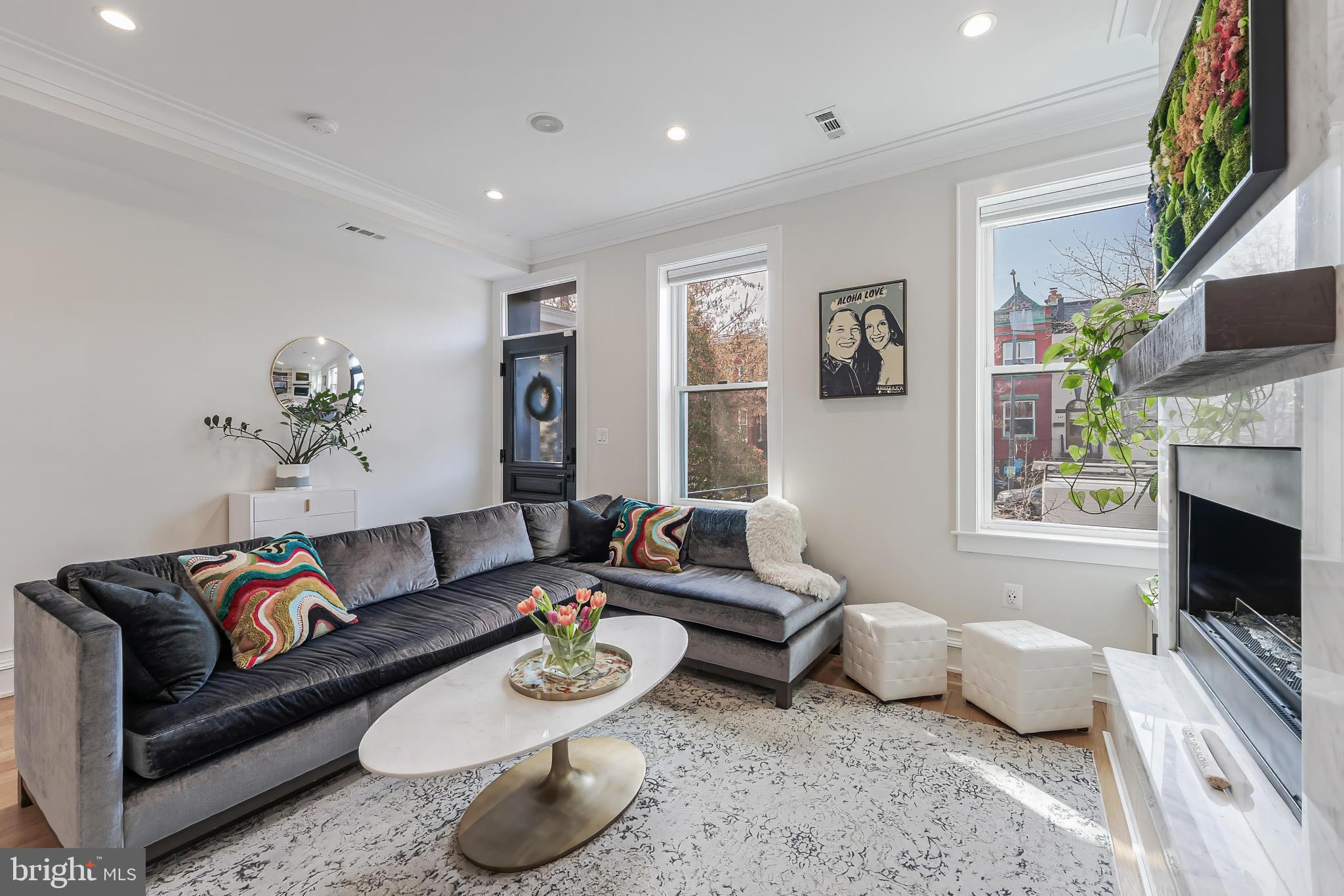 648 F Street Northeast Washington, DC 20002 - Photo 4 of 45 SUNNY LIVING ROOM WITH FIREPLACE AND BUILT-INS