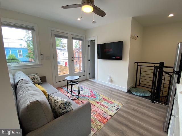 648 F Street Northeast Washington, DC 20002 - Photo 39 of 45 CARRIAGE HOUSE UPPER LEVEL LIVING ROOM/MURPHY BED