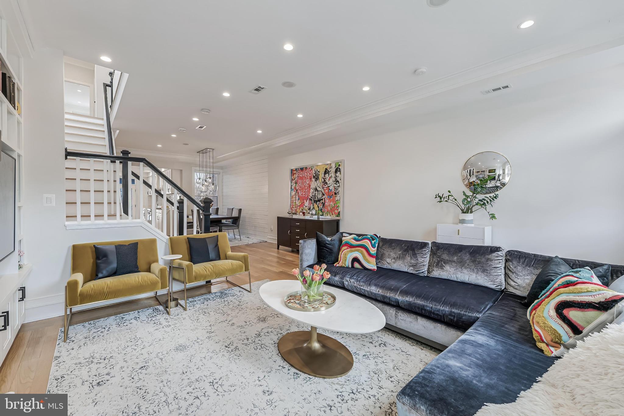 648 F Street Northeast Washington, DC 20002 - Photo 5 of 45 SUNNY LIVING ROOM WITH FIREPLACE AND BUILT-INS