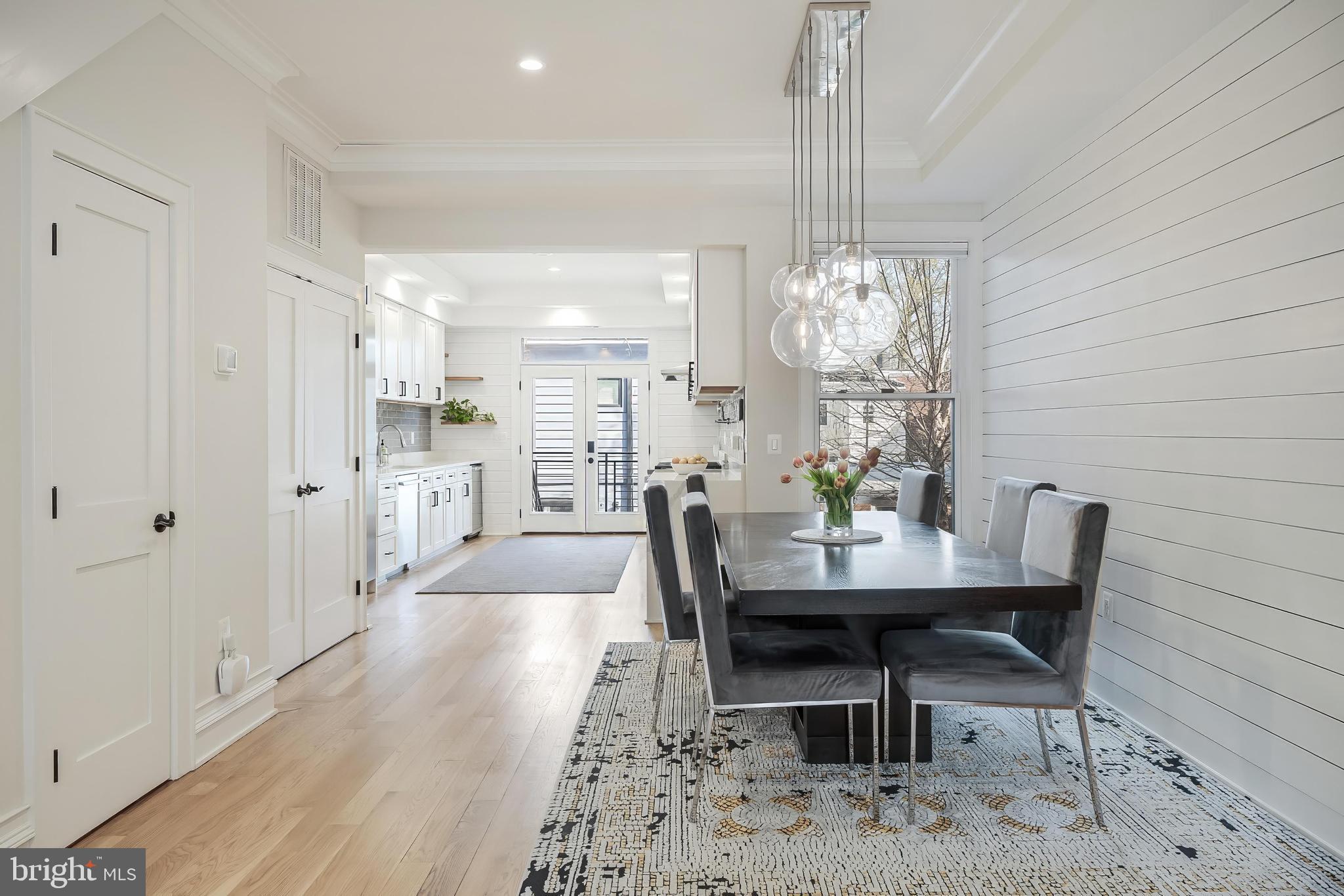 648 F Street Northeast Washington, DC 20002 - Photo 43 of 45 a view of a dining room with furniture window and wooden floor