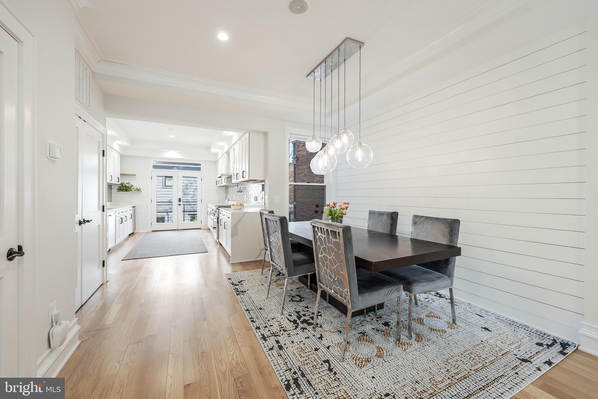 648 F Street Northeast Washington, DC 20002 - Photo 44 of 45 a dining room with furniture and wooden floor