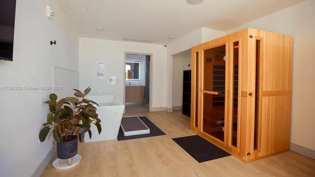 a view of a room with gym equipment