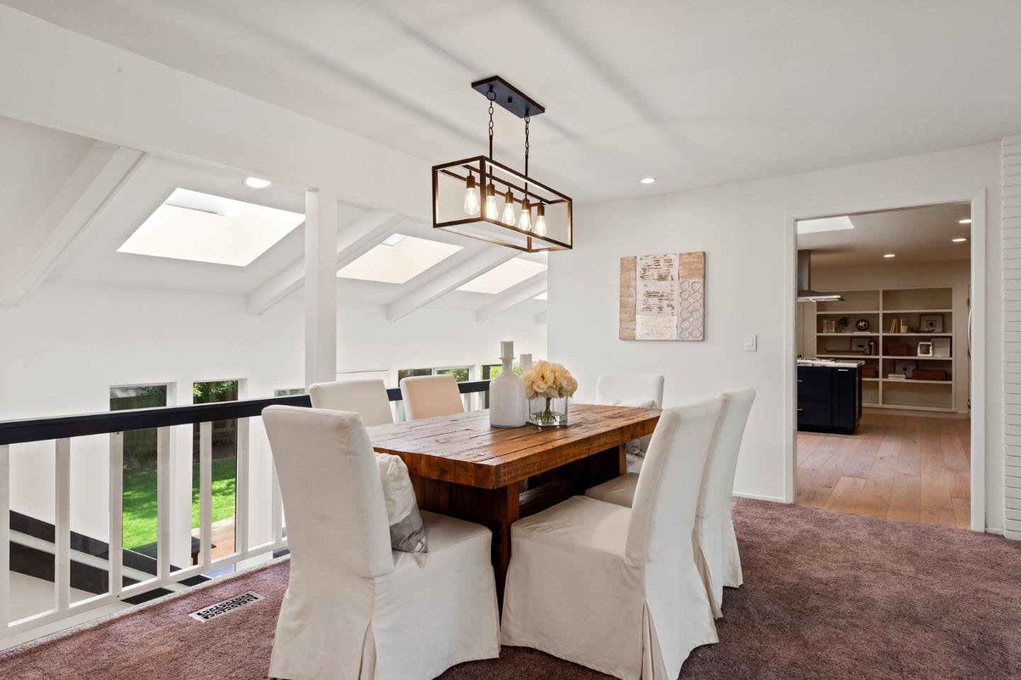 721 Occidental Avenue San Mateo, CA 94402 - Photo 15 of 60 a view of a dining room with furniture window and wooden floor