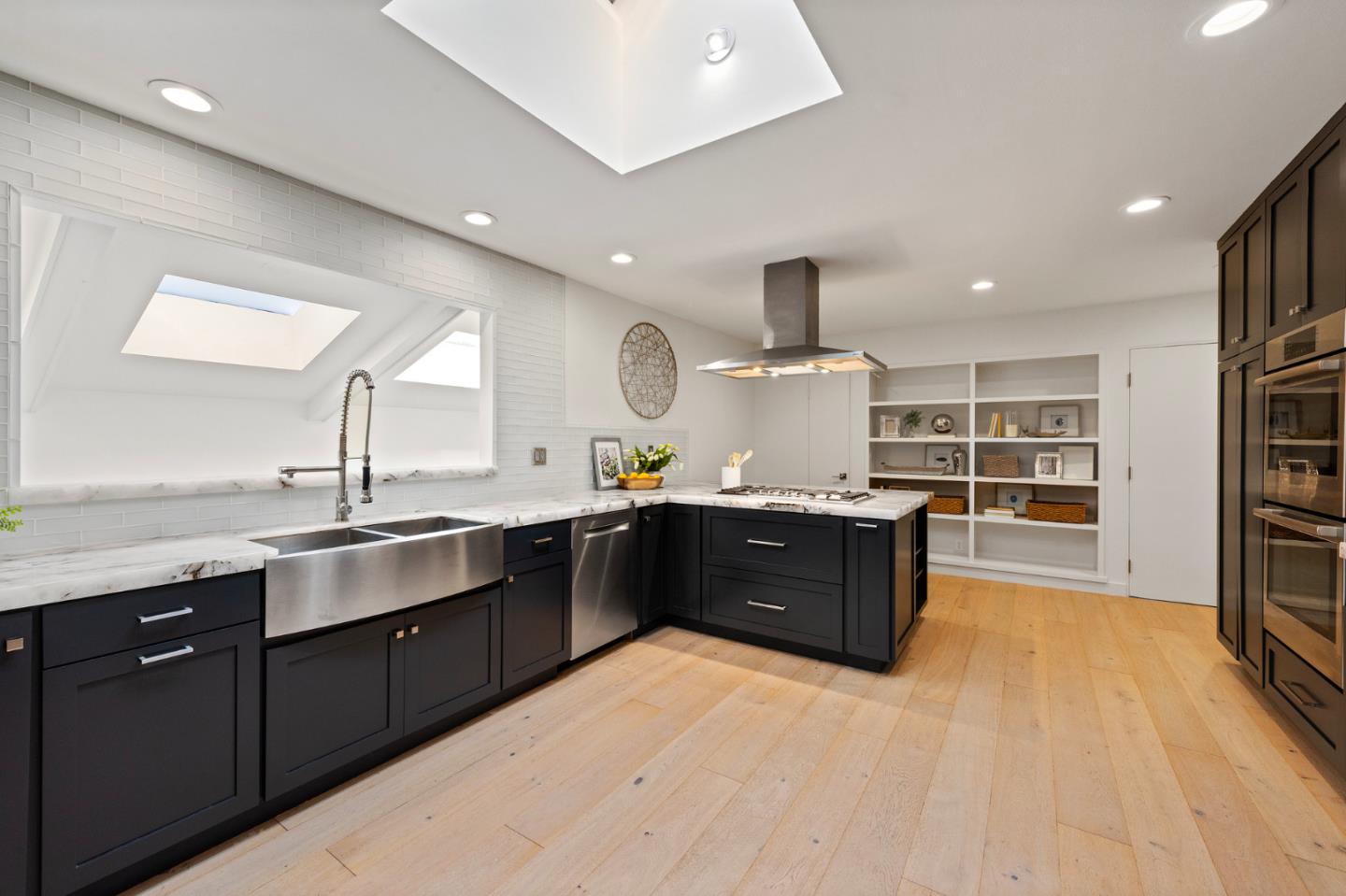 721 Occidental Avenue San Mateo, CA 94402 - Photo 16 of 60 a large kitchen with lots of counter space and a sink