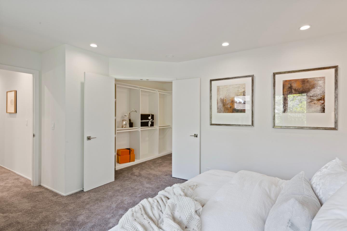 721 Occidental Avenue San Mateo, CA 94402 - Photo 27 of 60 a bedroom with a bed and a view of kitchen