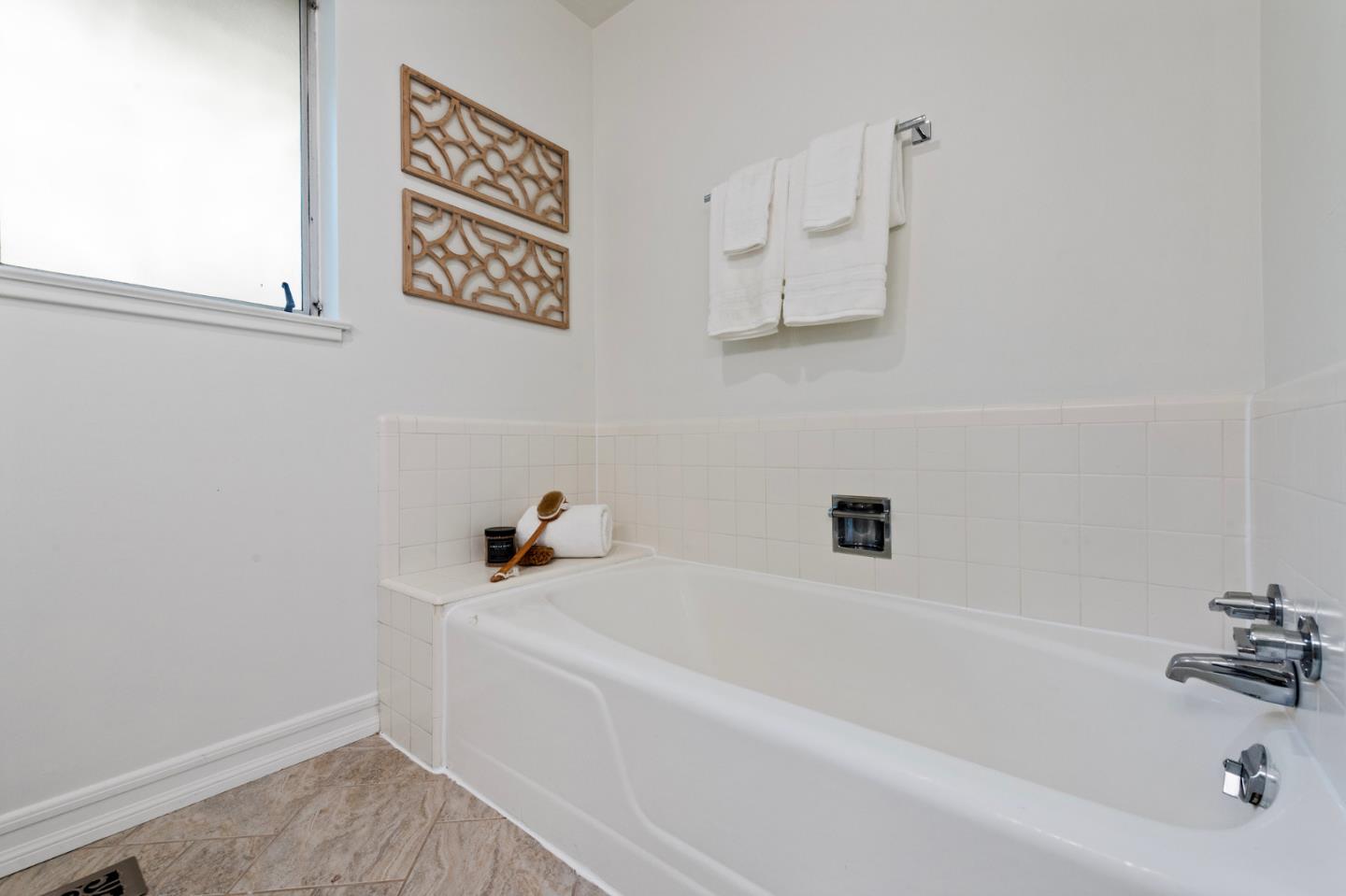 721 Occidental Avenue San Mateo, CA 94402 - Photo 34 of 60 a bathroom with a bathtub
