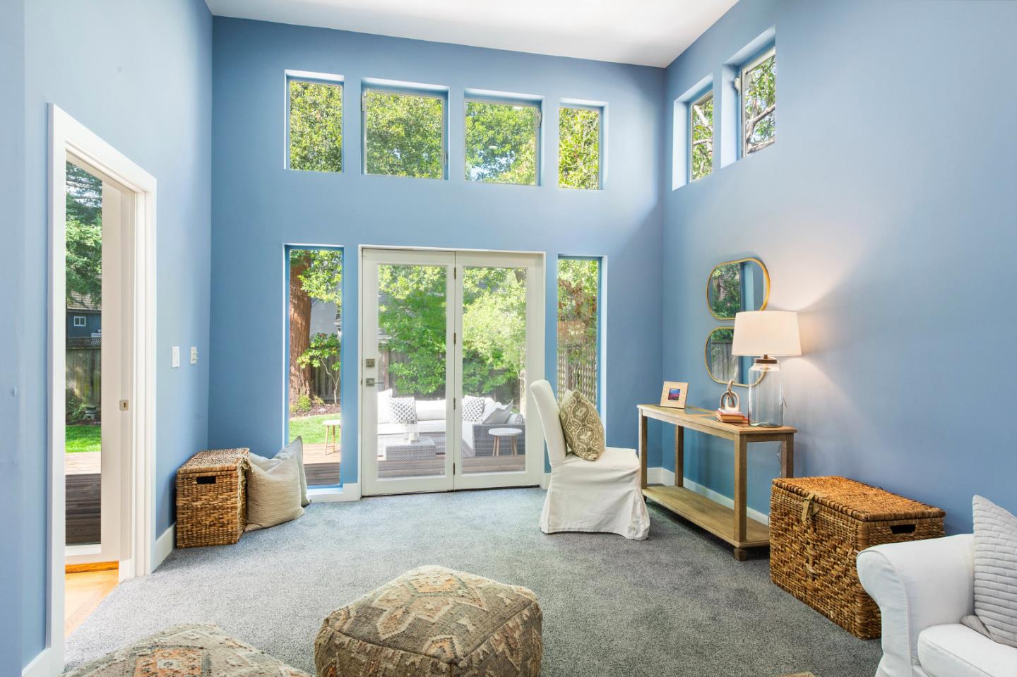 721 Occidental Avenue San Mateo, CA 94402 - Photo 43 of 60 a bedroom with a bed and a couch next to a window