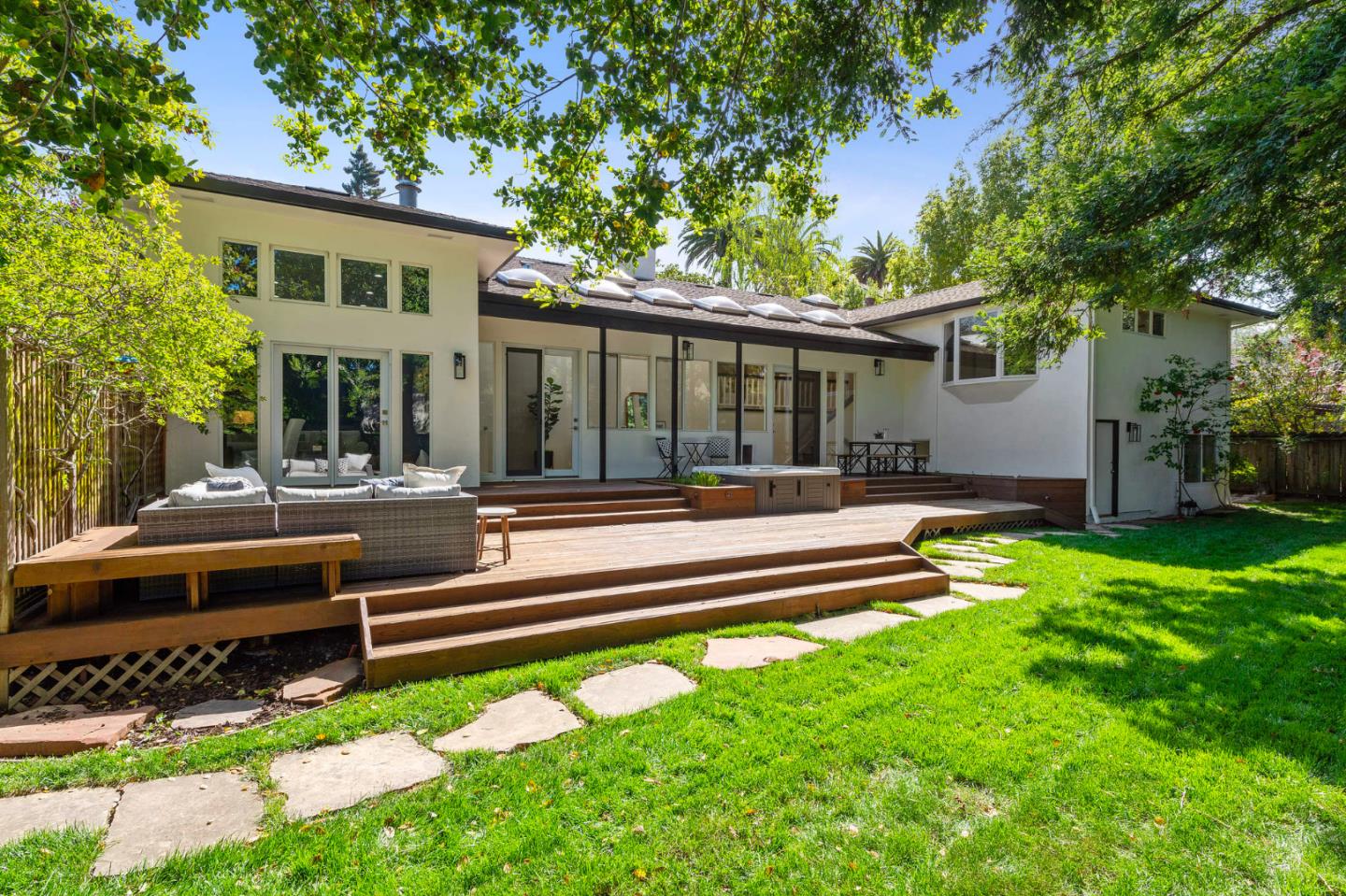 721 Occidental Avenue San Mateo, CA 94402 - Photo 54 of 60 a view of a house with a swimming pool and a yard