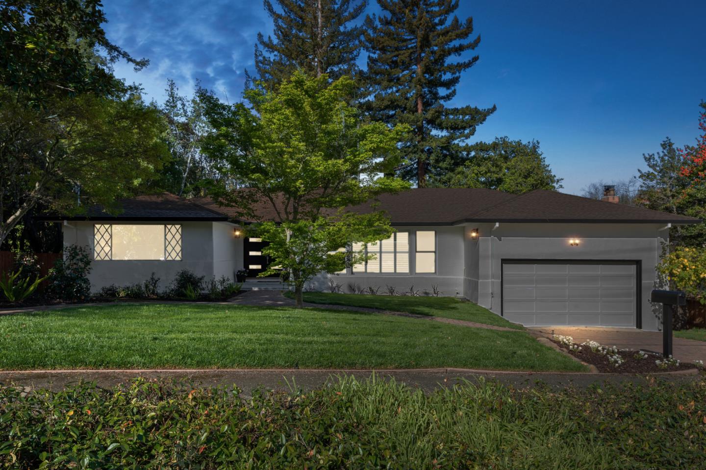 721 Occidental Avenue San Mateo, CA 94402 - Photo 58 of 60 a front view of a house with a yard and garage