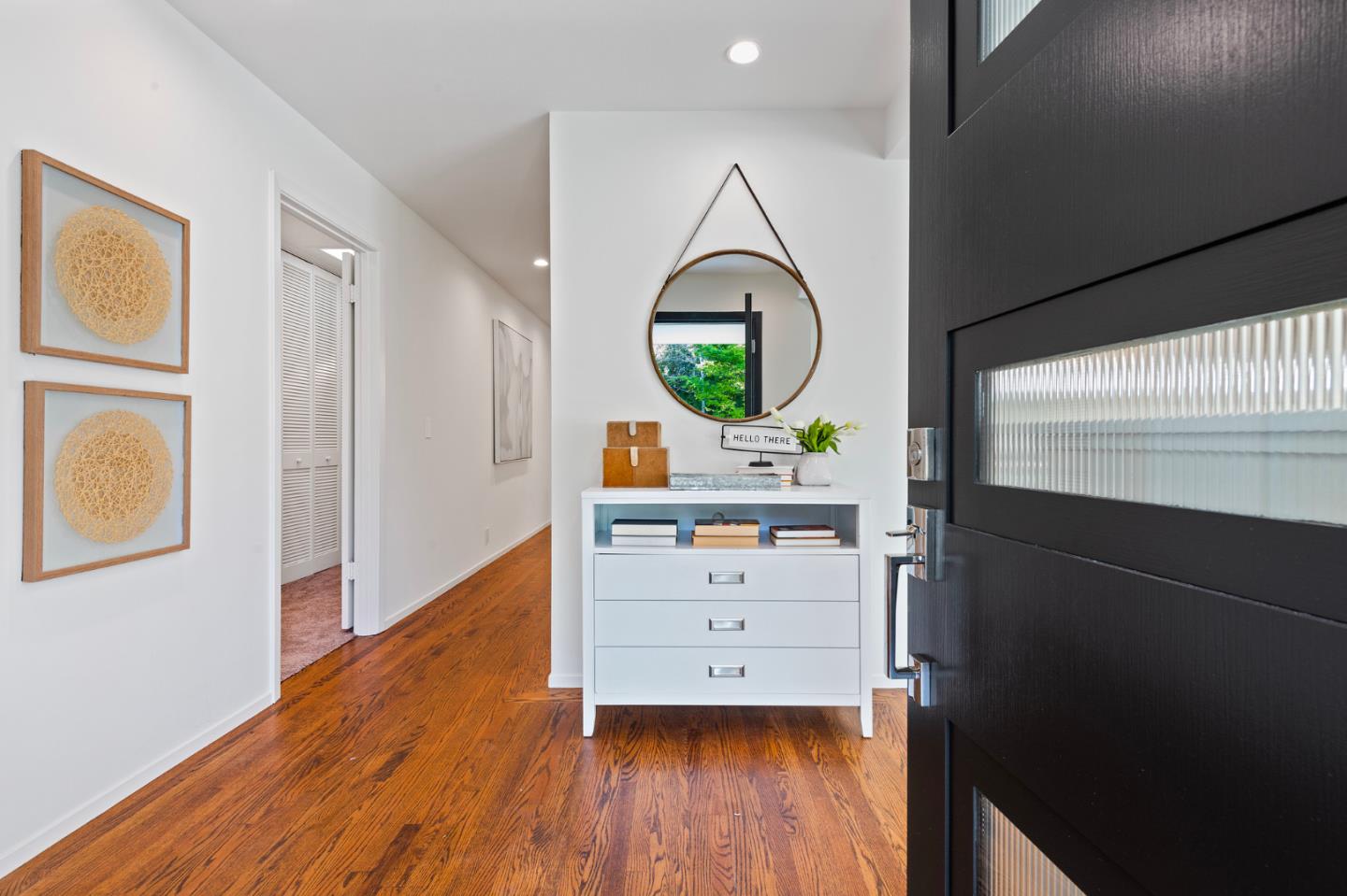 721 Occidental Avenue San Mateo, CA 94402 - Photo 6 of 60 a room with painting on the wall and a window