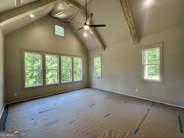106 Equestrian Drive Forsyth, GA 31029 - Photo 9 of 52 an empty room with wooden floor and windows