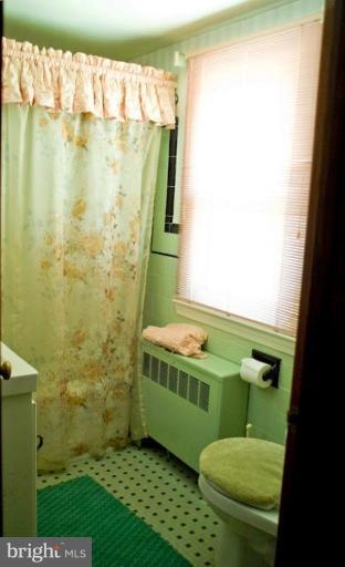 8404 Rocky Springs Road Frederick, MD 21702 - Photo 12 of 26 a bathroom with a sink toilet and shower