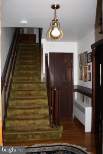 8404 Rocky Springs Road Frederick, MD 21702 - Photo 15 of 26 a view of entryway and hall with wooden floor