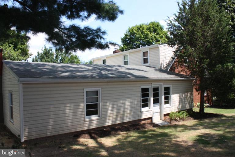 8404 Rocky Springs Road Frederick, MD 21702 - Photo 19 of 26 a house view with a backyard space