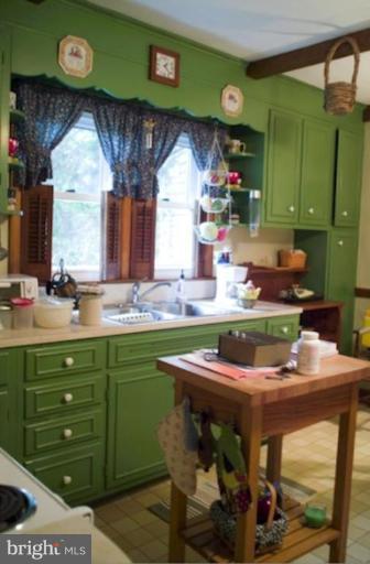 8404 Rocky Springs Road Frederick, MD 21702 - Photo 23 of 26 a room with sink and mirror
