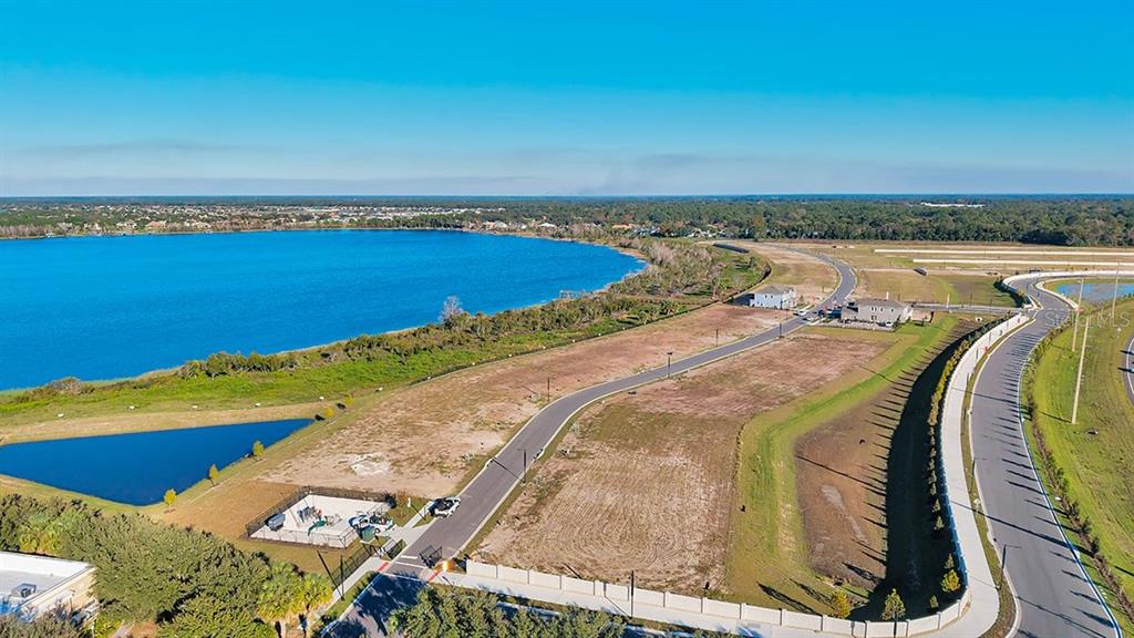 32472 Sea Loch Loop Mount Dora, FL 32757 - Photo 26 of 31 a view of a lake and outdoor space