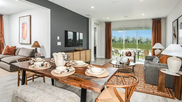 a view of a dining room with furniture