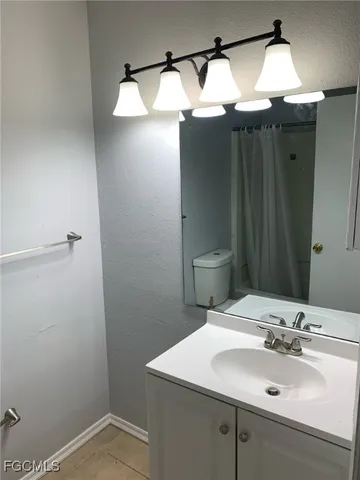 a bathroom with a shower and a bath tub