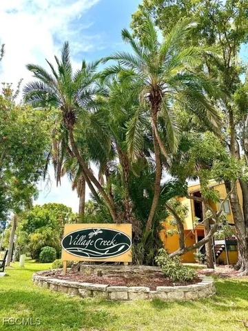 a view of outdoor space with water fountain