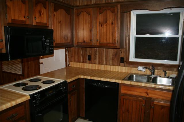 3458 Leanna Road Murfreesboro, TN 37129 - Photo 13 of 20 KITCHEN IN MAIN HOUSE WITH LOTS OF BUILT IN CABINETS, BUILT IN MICROWAVE, ADDITIONAL WASHER/DRYER HOOKUPS, AND WATER FILTER SYSTEM - 3458 LEANNA ROAD, MURFREESBORO, TN 37129
