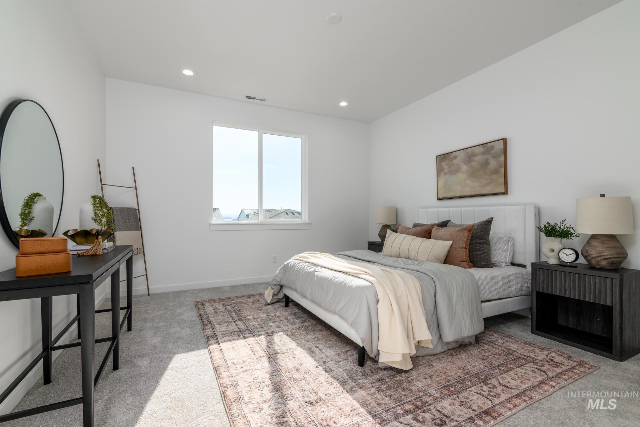 855 West Bay Street Middleton, ID 83644 - Photo 9 of 13 Bedroom featuring light carpet and recessed lighting