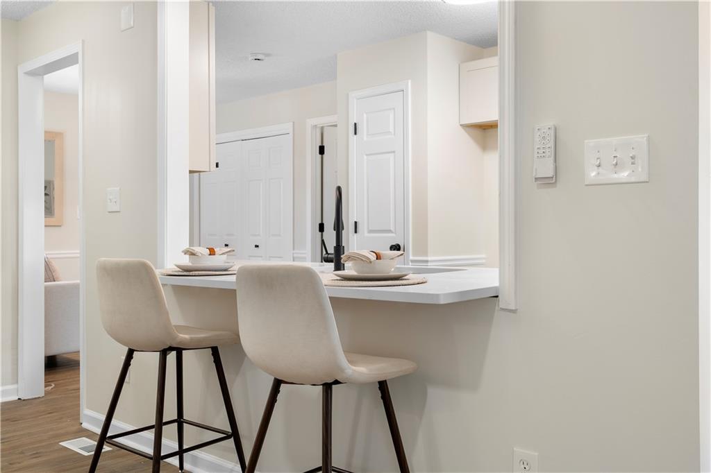 323 Lumpkin Street Winder, GA 30680 - Photo 7 of 30 a view of a dining room with chairs
