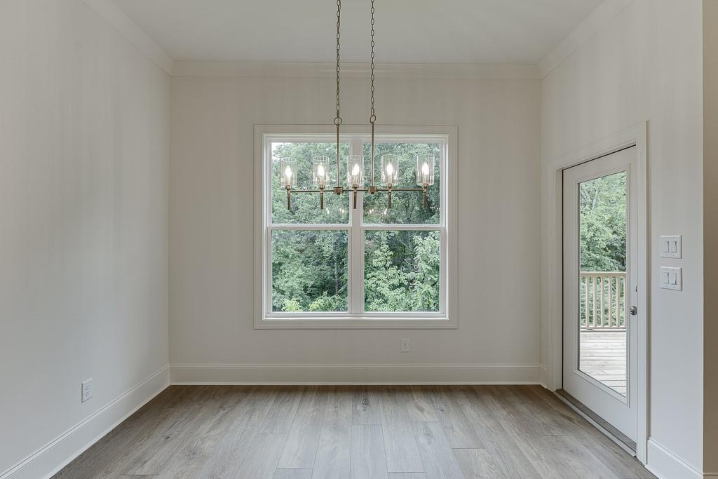 314 Level Creek Road Sugar Hill, GA 30518 - Photo 22 of 62 a view of room window and hardwood floor