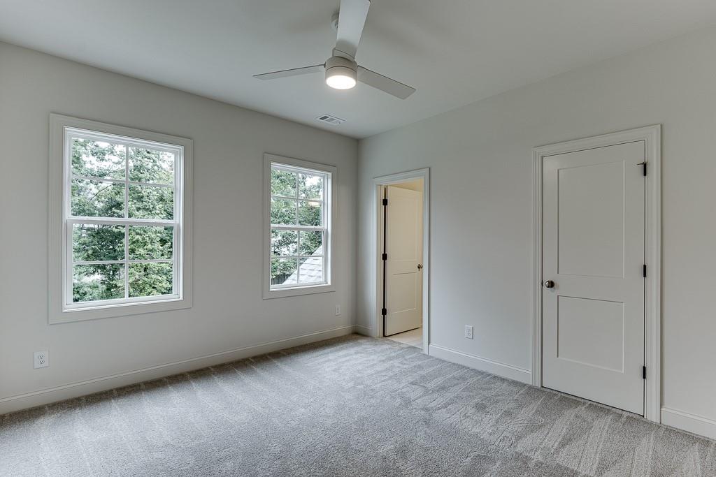 314 Level Creek Road Sugar Hill, GA 30518 - Photo 37 of 62 a view of an empty room with a window