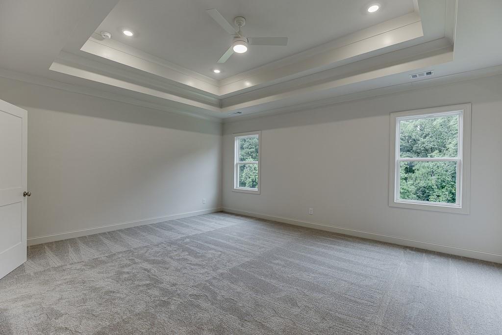 314 Level Creek Road Sugar Hill, GA 30518 - Photo 40 of 62 an empty room with windows