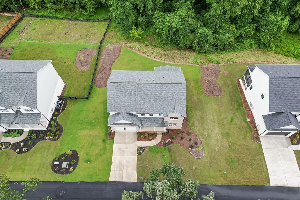 314 Level Creek Road Sugar Hill, GA 30518 - Photo 60 of 62 an aerial view of a house with a garden