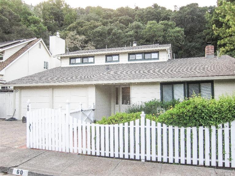 60 Dominican Drive San Rafael, CA 94901 - Photo 1 of 1 a front view of a house with a garden and plants