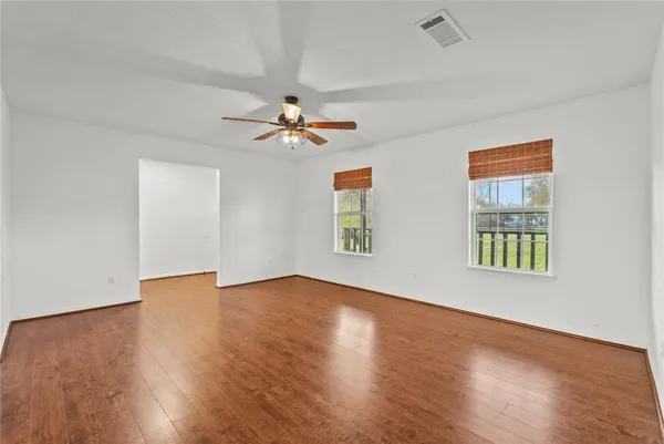 a kitchen with a sink and a refrigerator