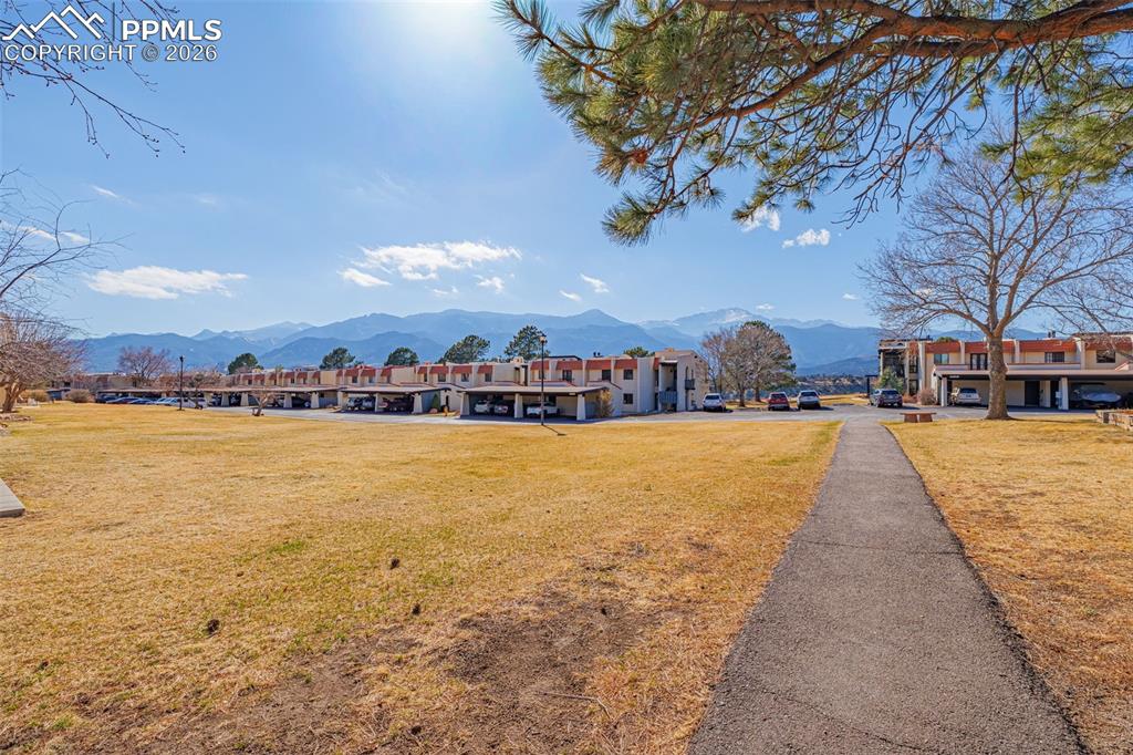 1018 Fontmore Road, Unit C Colorado Springs, CO 80904 - Photo 30 of 33 a view of outdoor space with swimming pool and ocean view