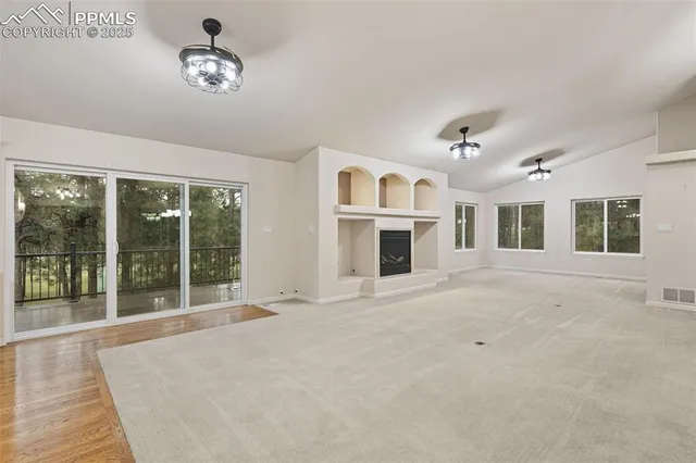 a bathroom with a sink mirror and toilet