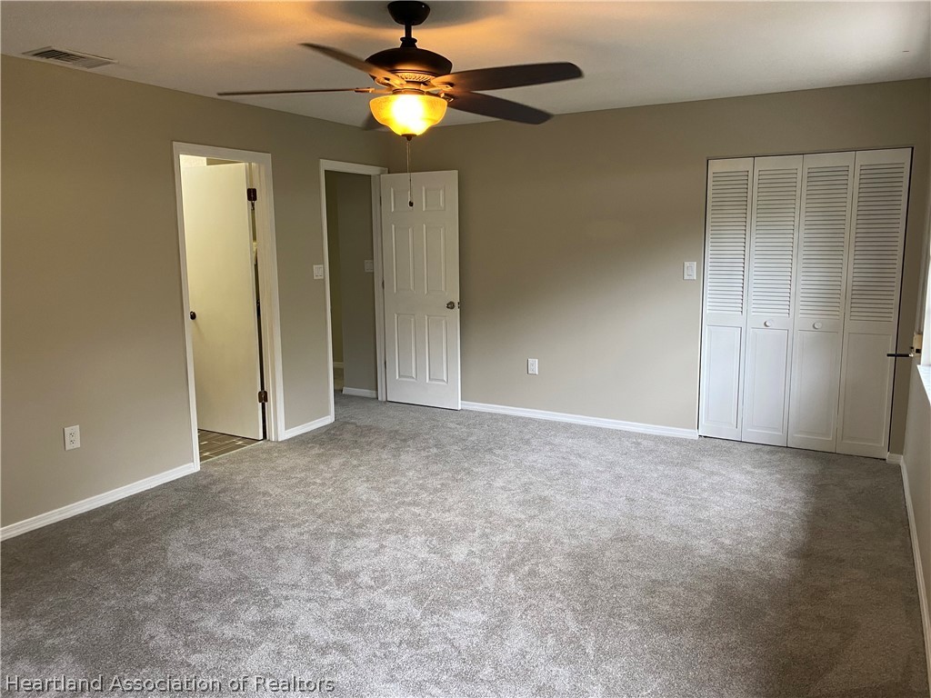 15 Victory Way Lake Placid, FL 33852 - Photo 18 of 36 a view of an empty room with a fan
