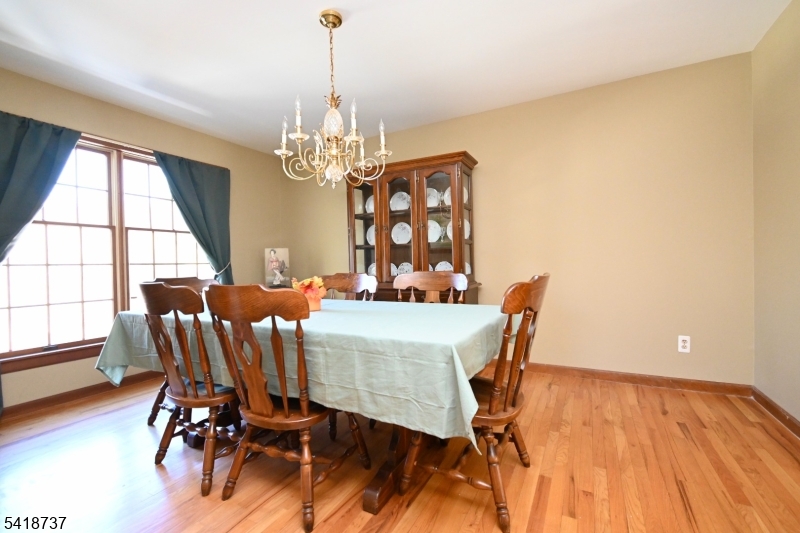 189 School House Road Oak Ridge, NJ 07438 - Photo 12 of 29 a view of a dining room with furniture window and wooden floor