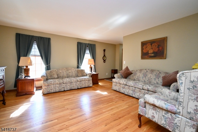 189 School House Road Oak Ridge, NJ 07438 - Photo 13 of 29 a living room with furniture and a couch