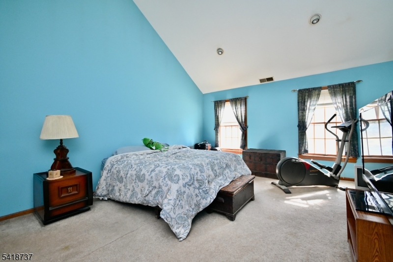 189 School House Road Oak Ridge, NJ 07438 - Photo 17 of 29 a bedroom with bed and window