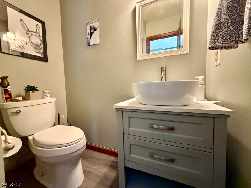 189 School House Road Oak Ridge, NJ 07438 - Photo 10 of 29 a bathroom with a toilet and a sink